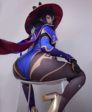 epicinternetgf rocking her Mona cosplay (Genshin Impact)