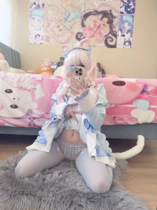 small cat girl wondering